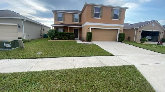 view of front property with a front lawn and a garage