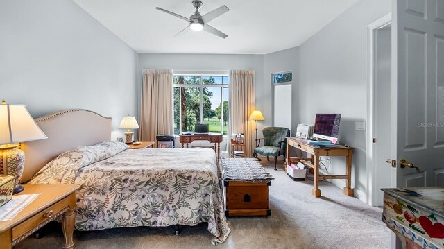 bedroom with ceiling fan and carpet