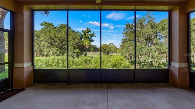 unfurnished sunroom with a wealth of natural light