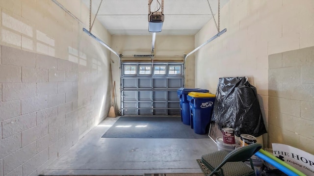 garage featuring a garage door opener