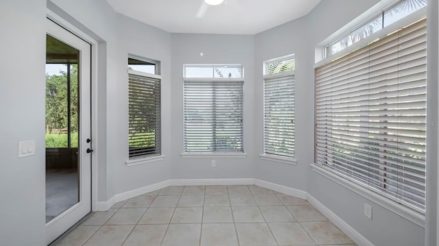 unfurnished sunroom with plenty of natural light