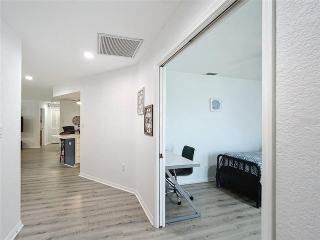 hallway featuring light hardwood / wood-style floors