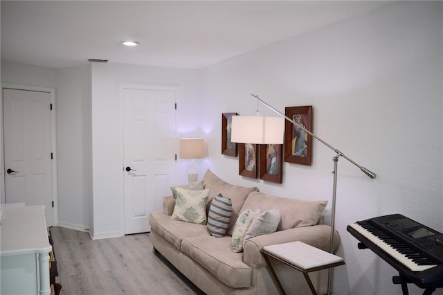 living room featuring light wood-type flooring