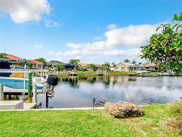 water view featuring a dock