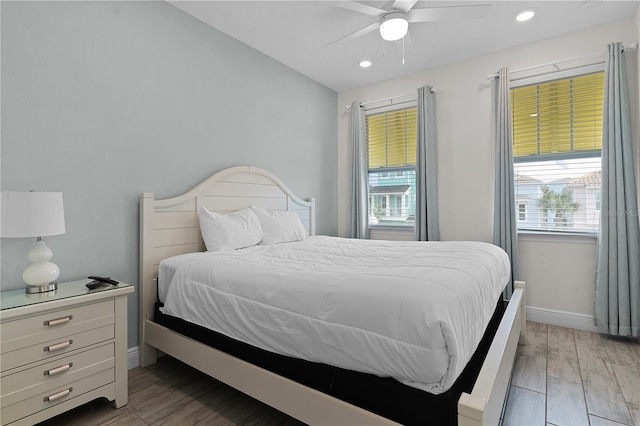 bedroom featuring ceiling fan and light hardwood / wood-style flooring