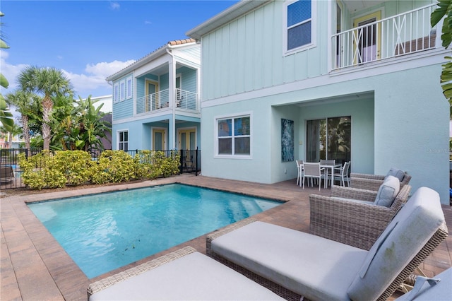 view of swimming pool featuring a patio