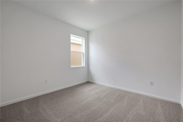 empty room featuring carpet flooring