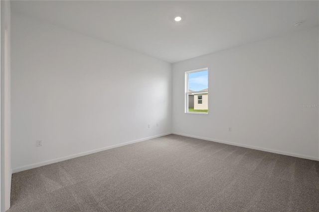 empty room with carpet floors