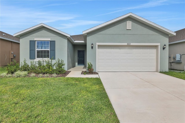 single story home with a garage and a front lawn