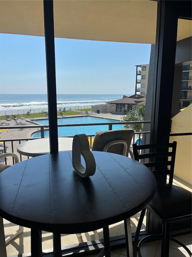 dining area with a water view