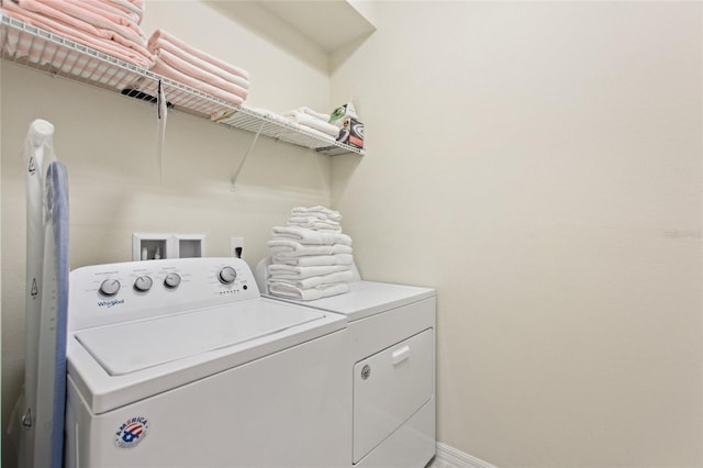 clothes washing area featuring washer and dryer and hookup for a washing machine