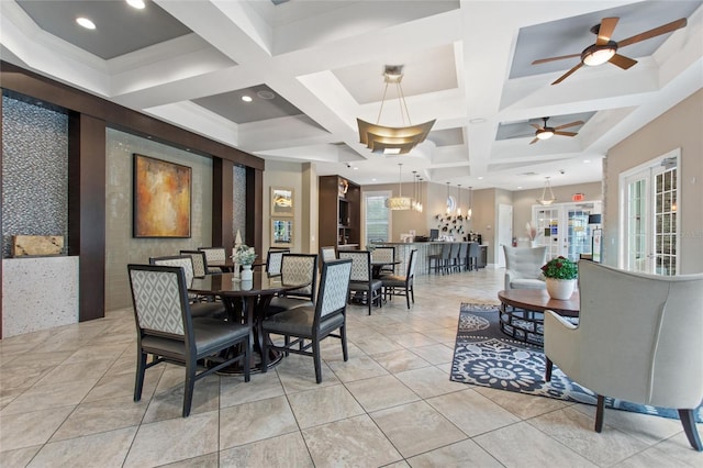 dining space featuring french doors, ceiling fan, light tile floors, beamed ceiling, and coffered ceiling