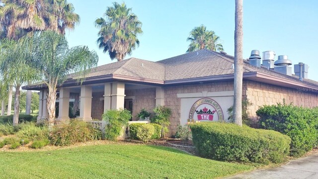 view of front of home with a front lawn