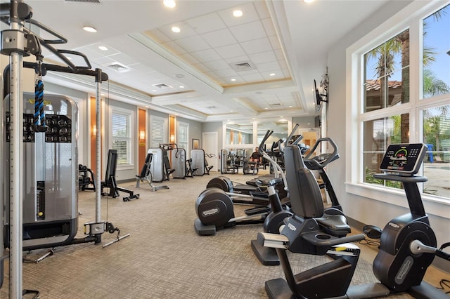 exercise room with coffered ceiling, light carpet, and ornamental molding