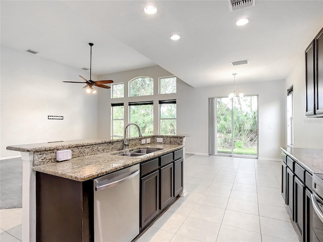 kitchen with pendant lighting, dishwasher, a healthy amount of sunlight, and sink