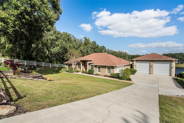 10120 Lakeshore Dr, Clermont, FL 34711 - view of front of home featuring a detached garage and stucco siding