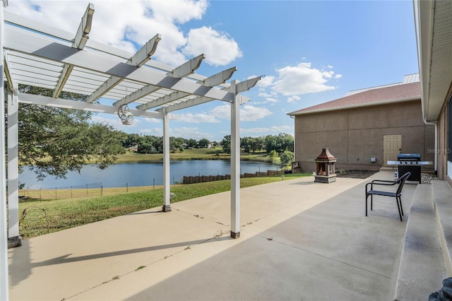 10120 Lakeshore Dr, Clermont, FL 34711 - view of patio with a water view, a pergola, and grilling area