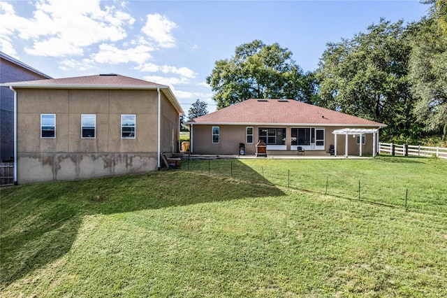 10120 Lakeshore Dr, Clermont, FL 34711 - back of property featuring stucco siding and a patio