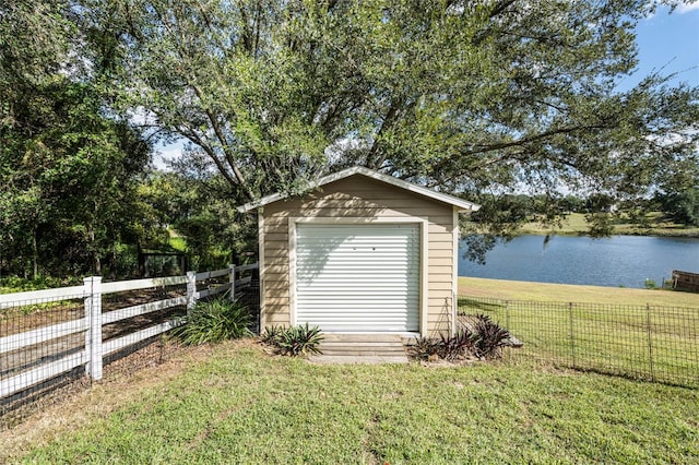10120 Lakeshore Dr, Clermont, FL 34711 - view of shed with a water view and a fenced backyard