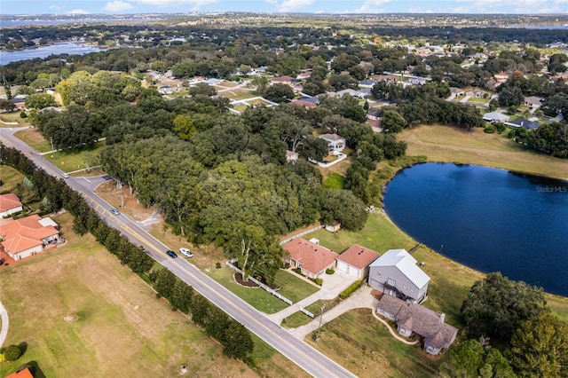 10120 Lakeshore Dr, Clermont, FL 34711 - aerial overview of property's location featuring a large body of water and nearby suburban area