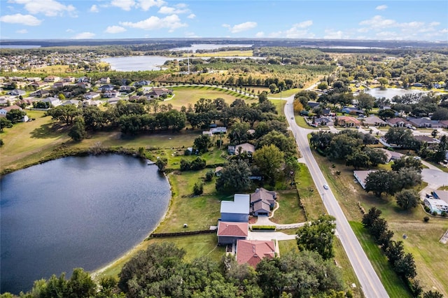 10120 Lakeshore Dr, Clermont, FL 34711 - aerial overview of property's location featuring a nearby body of water and nearby suburban area