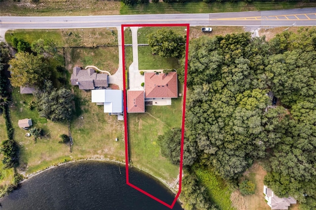 10120 Lakeshore Dr, Clermont, FL 34711 - aerial overview of property's location with property boundaries highlighted and a nearby body of water