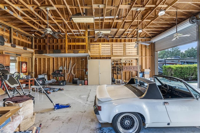10120 Lakeshore Dr, Clermont, FL 34711 - garage with a ceiling fan