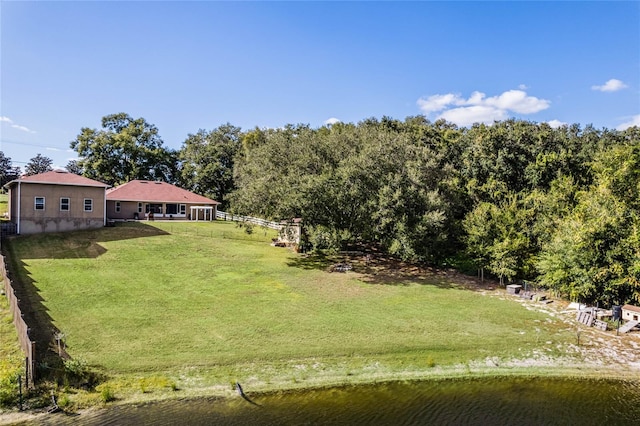 10120 Lakeshore Dr, Clermont, FL 34711 - view of grassy yard featuring a water view