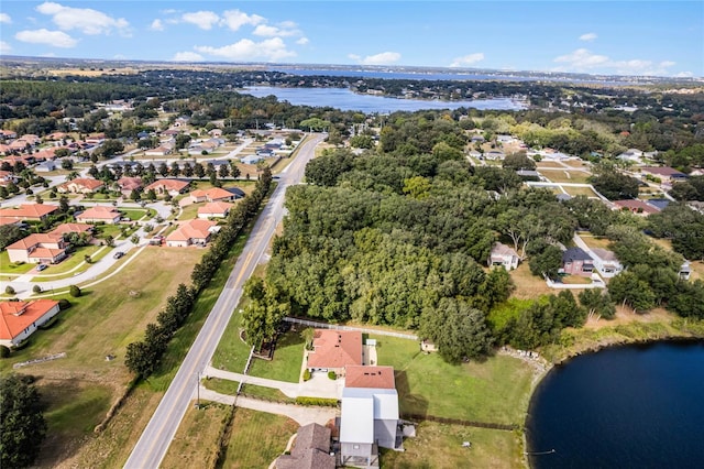 10120 Lakeshore Dr, Clermont, FL 34711 - aerial overview of property's location featuring a large body of water and nearby suburban area