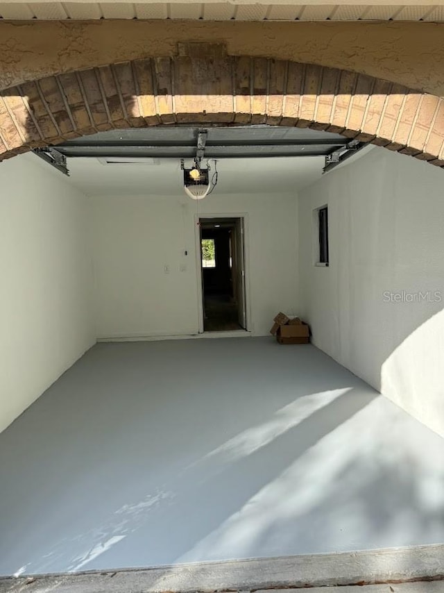 interior space with a garage door opener