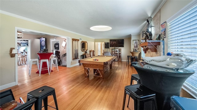 playroom featuring ornamental molding, wood-type flooring, and billiards