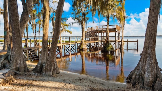 view of dock with a water view