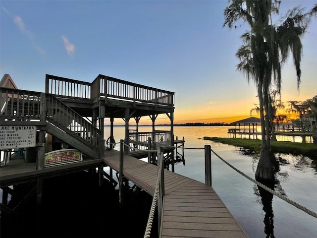 view of dock with a water view