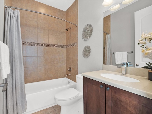 full bathroom with tile patterned floors, vanity, toilet, and shower / bath combo