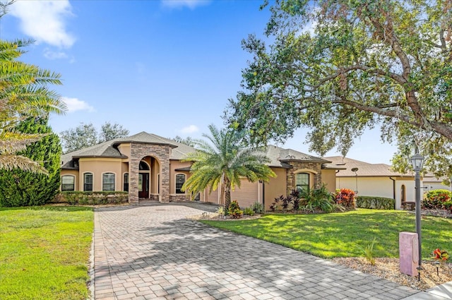 view of front of home with a front lawn