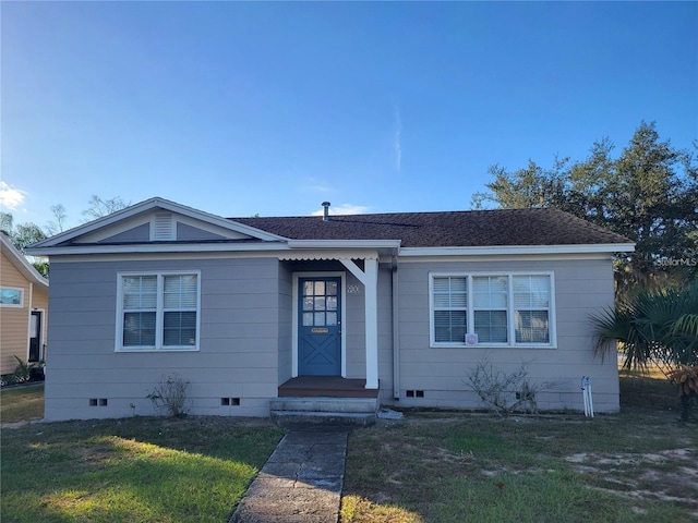 view of front facade with a front yard