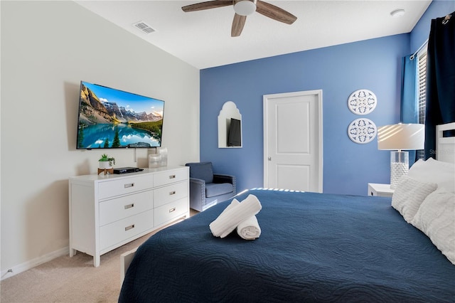 carpeted bedroom featuring ceiling fan