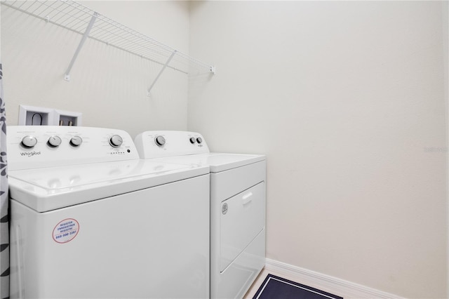 washroom with washer and clothes dryer