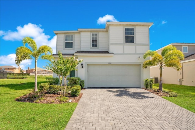2226 Lelani Cir, Davenport, FL 33897 - view of front facade featuring a front lawn and a garage