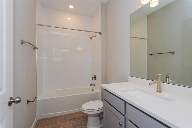 full bathroom with vanity, shower / bath combination, toilet, and tile patterned flooring