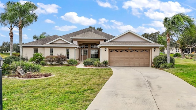 ranch-style house featuring a garage and a front lawn