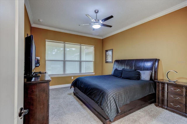 bedroom with crown molding, light carpet, and ceiling fan