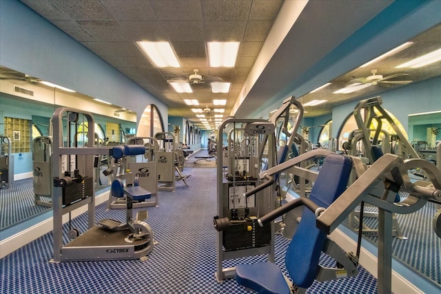 gym featuring a drop ceiling