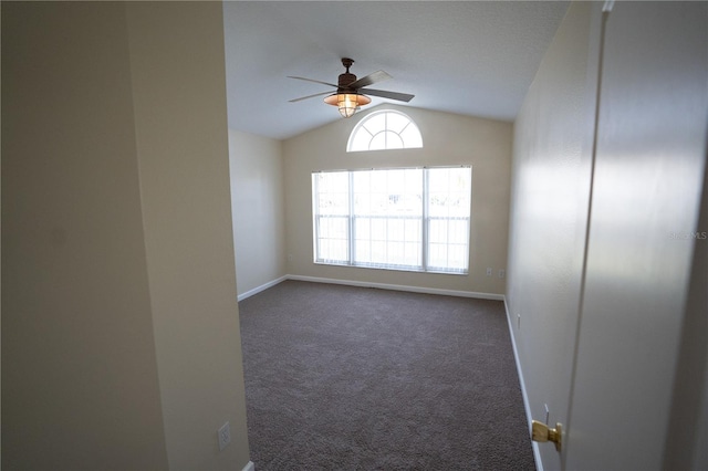 carpeted spare room with lofted ceiling and ceiling fan