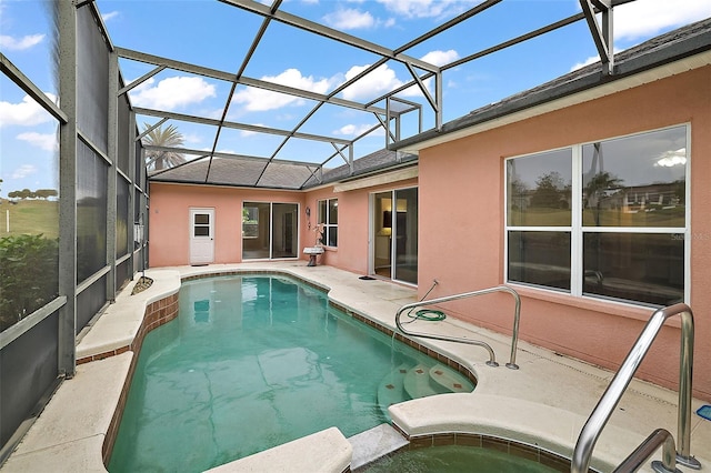 view of pool featuring a lanai and a patio area