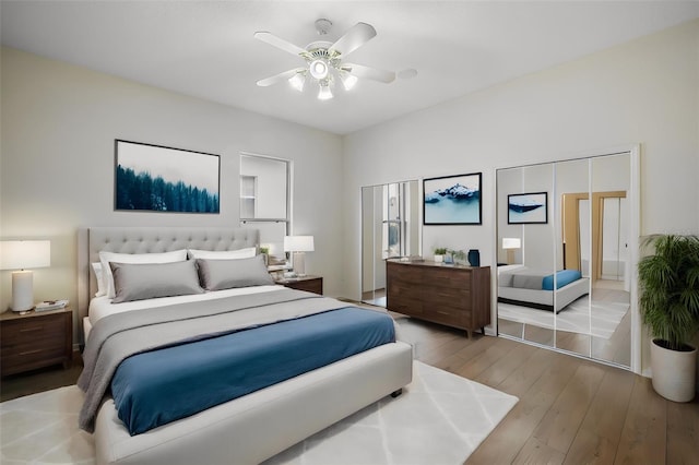 bedroom featuring ceiling fan and light hardwood / wood-style flooring