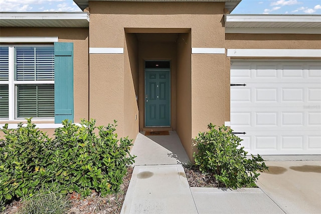 entrance to property with a garage