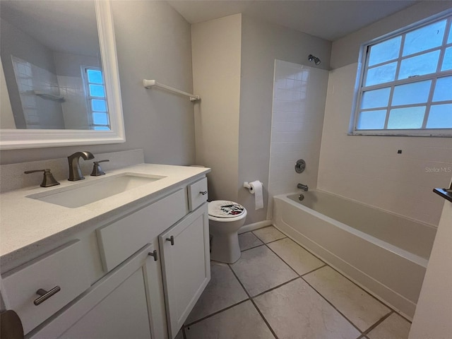 full bathroom featuring vanity, tile flooring, toilet, and tiled shower / bath