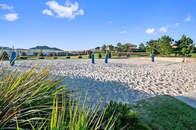 surrounding community featuring volleyball court