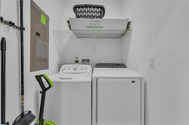 laundry area featuring separate washer and dryer and electric panel